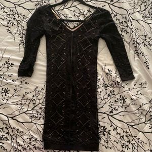 Bebe Dress in Black, Size Small. Bodycon style